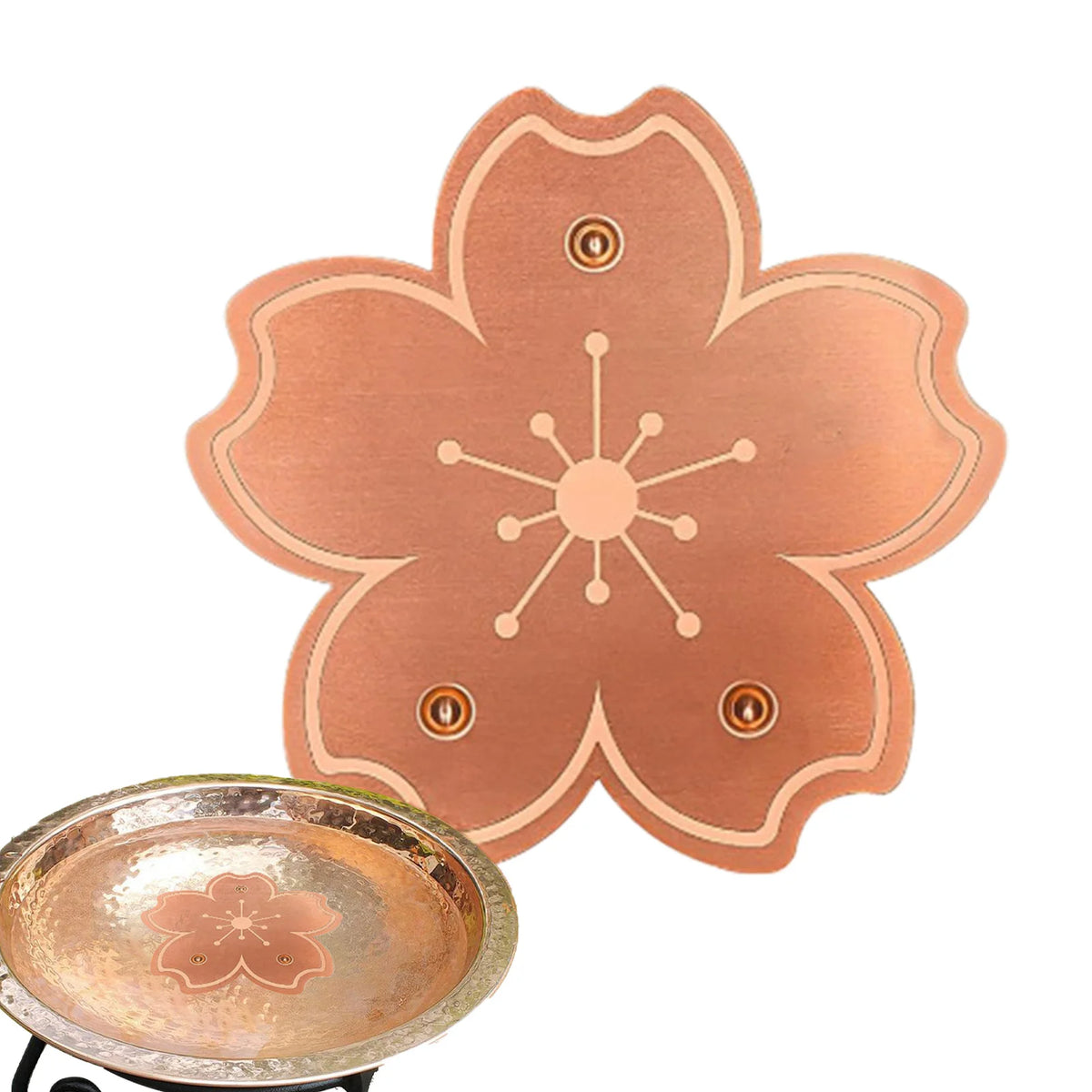 A copper disk with a floral design and multiple support points is shown next to a shallow, round metal dish.
