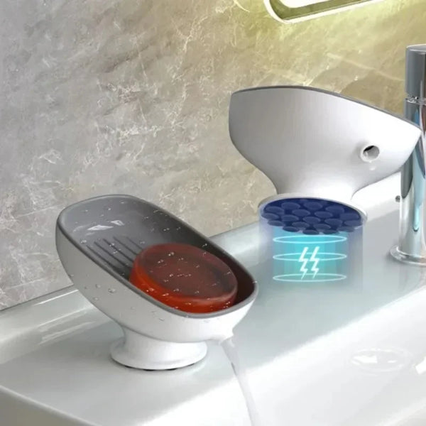 A white suction cup soap dish with a glowing blue lightning bolt design sits on a bathroom counter.
