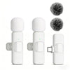A white wireless lavalier microphone with a fuzzy windscreen and a clip is shown in multiple views.