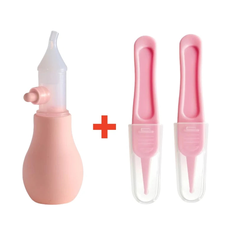 A pink gentle baby nasal aspirator with a silicone tip shown next to its disassembled parts.