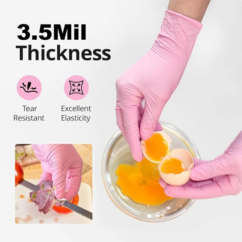 Pink nitrile disposable gloves demonstrating tear resistance and elasticity while handling food.