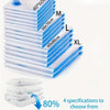 Stack of blue vacuum compression bags labeled M, L, and XL sizes for clothes and bedding