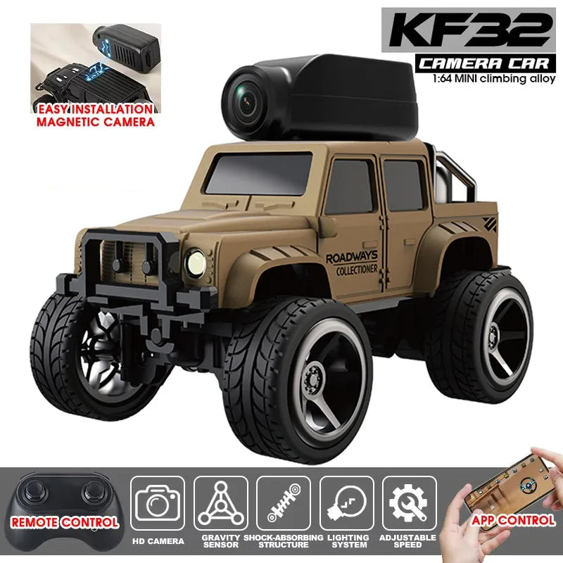 A tan RC climbing car model with a magnetic camera and remote control accessories.