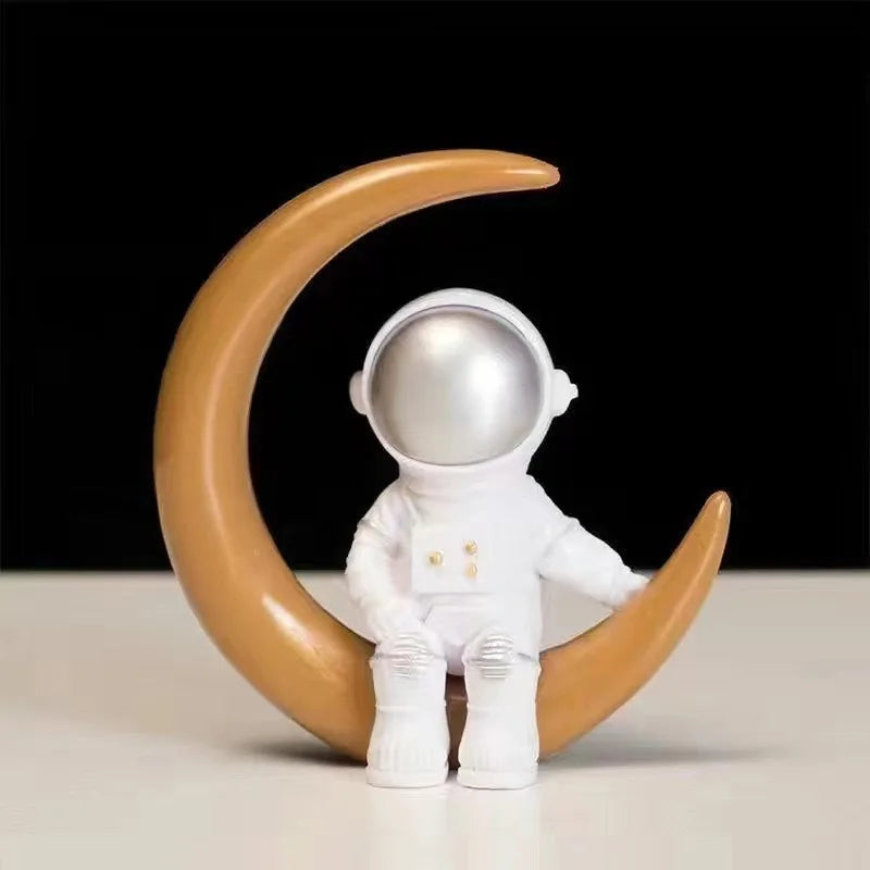 A handcrafted astronaut figurine resin spaceman desk decor against a black background.