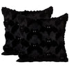 Black throw pillow cover featuring a pattern of small white Halloween ghosts and pumpkins.