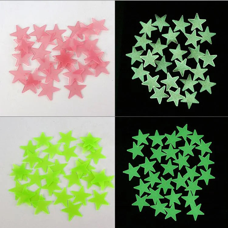 A set of 100 luminous star wall stickers for a kids' room, shown in pink and green colors.