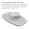 A white silicone body scrubber and massage brush with a convenient grip handle.