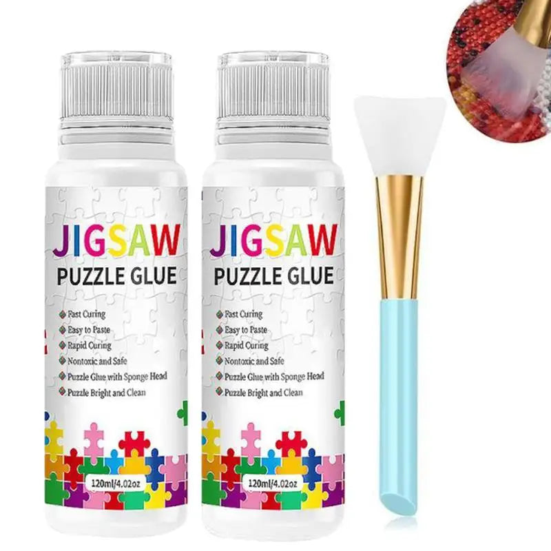 A bottle of Jigsaw Puzzle Glue with a sponge head and a brush applicator for diamond painting