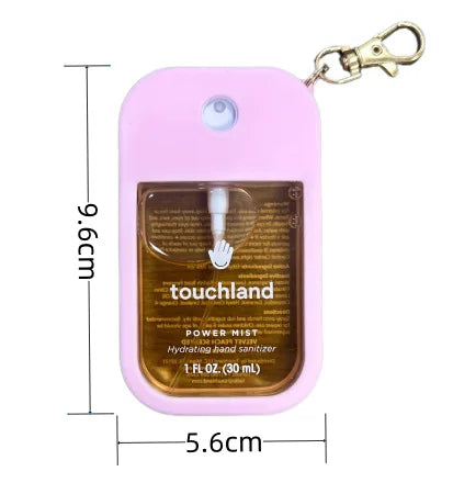 Pink silicone protective case for a hand sanitizer spray with a metal keyring