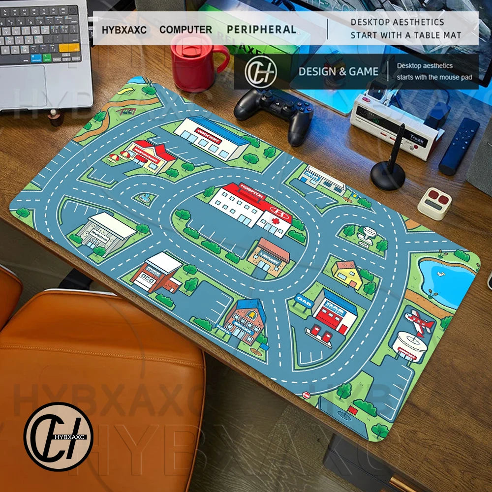 A large gaming mouse pad featuring a vintage city road design with buildings and greenery on a wooden desk.
