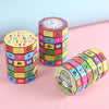A set of colorful wooden cubes used for teaching numbers and arithmetic, featuring letters and digits.