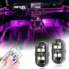 A hand holds a remote control next to two LED light strips designed for car interior ambient lighting.