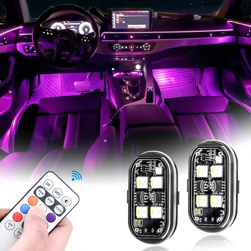 A hand holds a remote control next to two LED light strips designed for car interior ambient lighting.