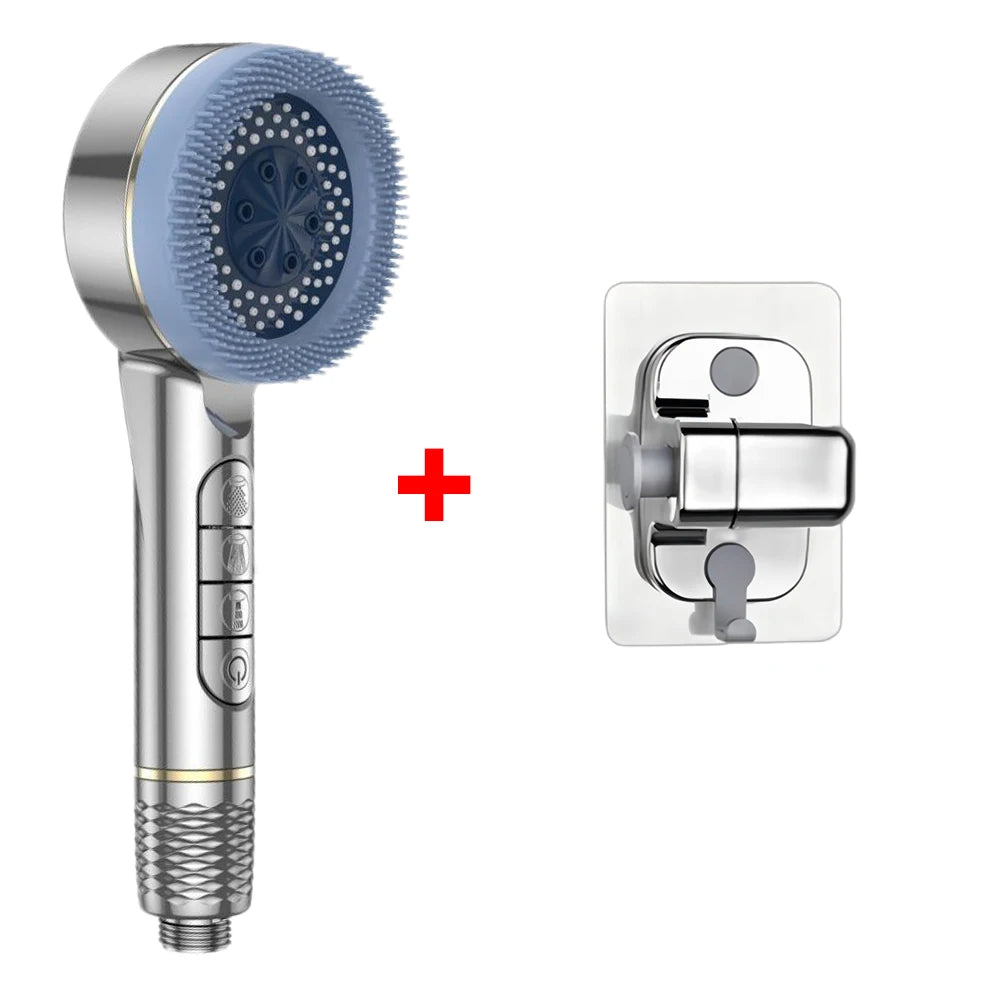 A handheld shower head with a silicone nozzle and a wall-mounted shower holder.