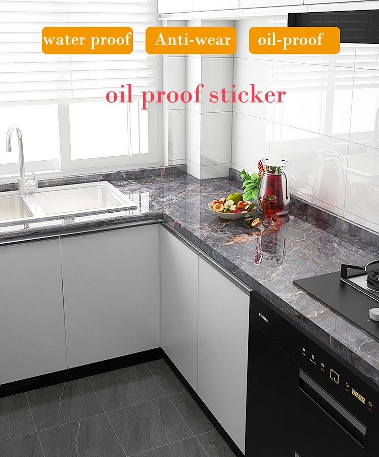 Oil proof sticker applied to a marble effect countertop and cabinet surface.