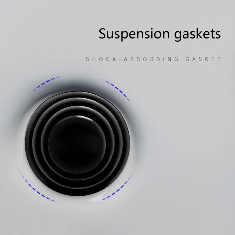 A close-up view of black shock-absorbing suspension gaskets arranged in concentric rings on a white background.
