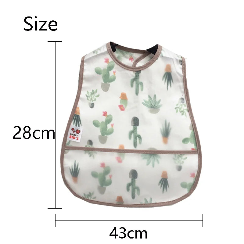 A white baby feeding bib with a cactus pattern and a catch pocket, shown flat.