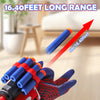 A hand holding a red and blue foam dart launcher with multiple blue darts, demonstrating the 16.40 feet long range.