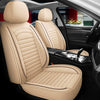 Light beige premium PU leather car seat covers shown inside a car cabin.