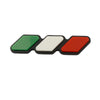 A set of three colored square emblems, green, white, and red, for a vehicle grille.
