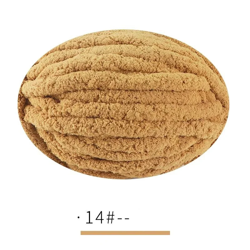 A round ball of light brown, extra thick chenille yarn for hand knitting.