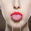 A close-up of a woman's mouth showing bright red lips and tongue being scraped with a stainless steel tool.