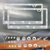 A crystal rhinestone license plate frame and various mounting hardware for cars.