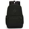 A black urban nylon backpack with a main compartment and a zippered pocket.