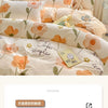 A set of pure cotton bedding including a duvet cover, fitted sheet, and pillowcases with floral patterns.