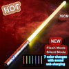 A glowing white lightsaber with a metal hilt and various colored light effects is displayed against a dark, smoky background.