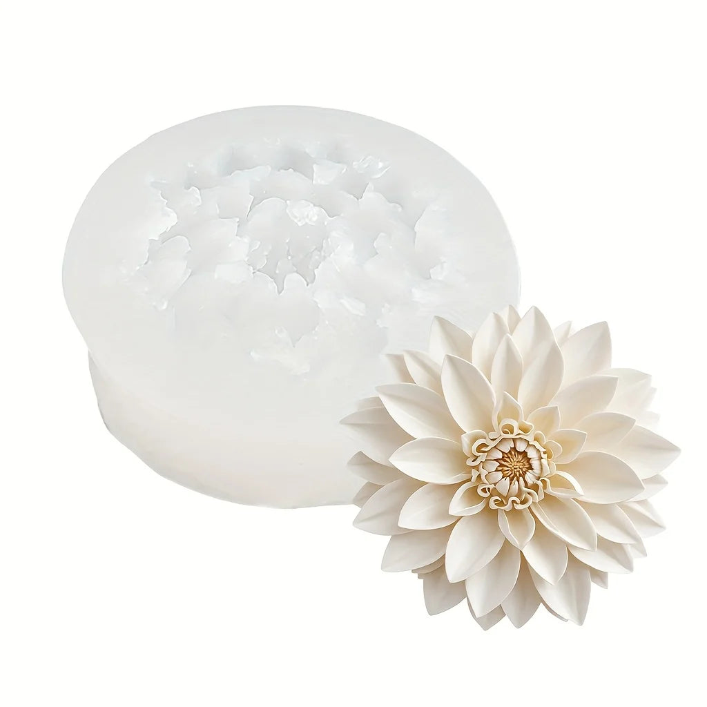 A white silicone mold shaped like a lotus flower, used for resin and craft projects.