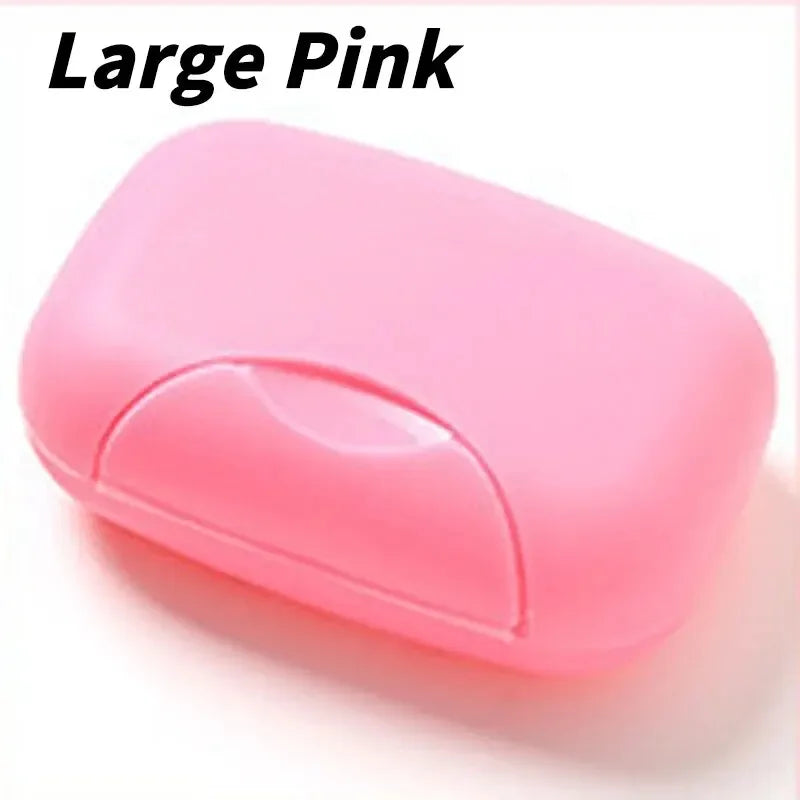 Large pink portable soap holder with a lid shown in a close-up view.