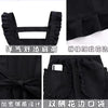 Black Korean style cotton kitchen apron with an adjustable neck strap and pleated details
