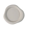A round, matte white silicone coaster with a slightly raised rim.