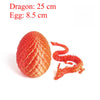 A red dragon figurine with an 8.5 cm egg, showing the dragon and a small snake-like creature.