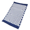 A dark blue acupressure mat with white dots, shown flat.