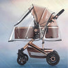 A universal waterproof stroller rain cover with a transparent shield is shown in brown and black.