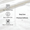 Instructions for washing and caring for a cozy high-density short plush throw blanket, showing machine wash, gentle cycle, an
