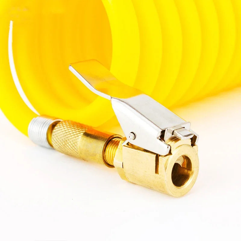 A brass tire inflator chuck with a quick-connect clip is shown next to a yellow tire inflation gauge.