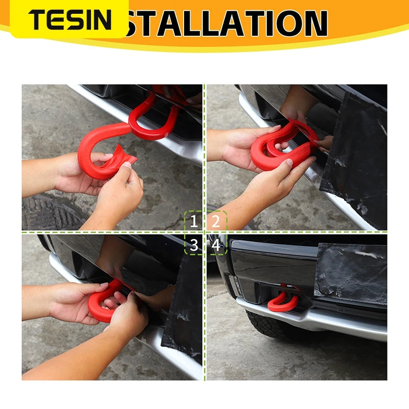 Installation steps showing how to attach a red tow hook cover to a vehicle's front bumper.