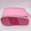 A pink breathable oxford cloth shoe storage bag shown from the top view.