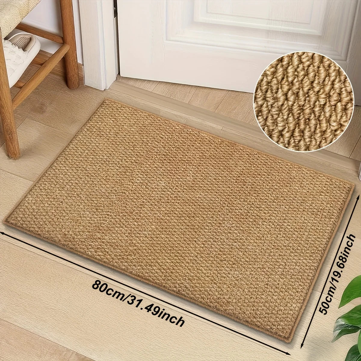 A rectangular natural fiber sisal kitchen runner rug in beige placed on a light wood floor.