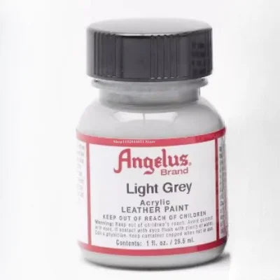 A bottle of Angelus Brand Light Grey acrylic leather paint for DIY projects.