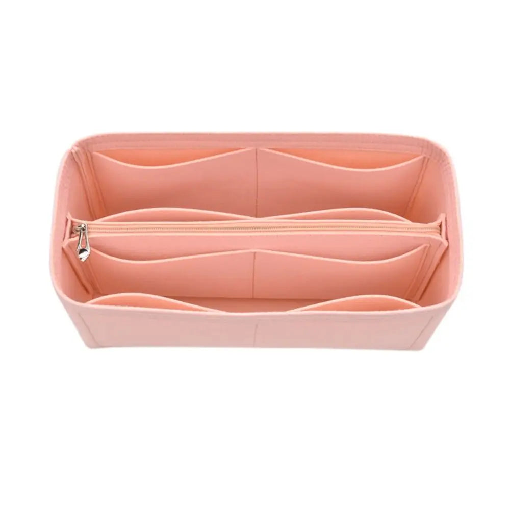 A light pink felt insert liner designed for handbags, showing the interior divided compartments.