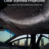 A car interior showing a clear starfield projection on the ceiling.