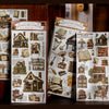 Sammlung von Vintage-Transferstickern mit antiken Büchern, Werkzeugen und Dekorationen für Scrapbooks