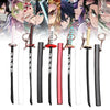 A collection of Demon Slayer mini katana replicas featuring various designs and metal swords.