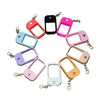 A collection of colorful silicone protective cases for hand sanitizer spray attached to a keyring.