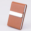 A brown slim PU leather card holder with a silver stainless steel card slot.