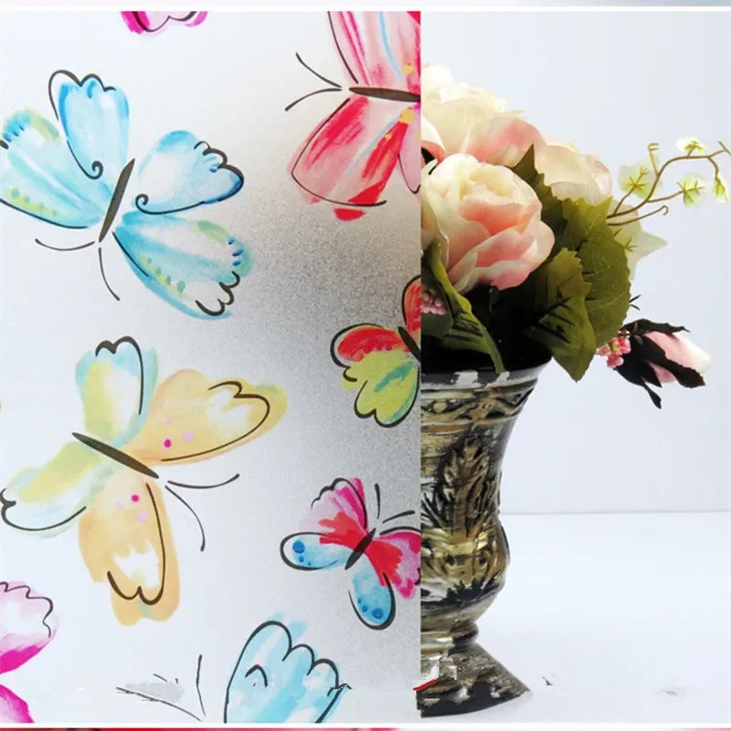 Frosted stripe privacy window film featuring colorful butterfly designs and floral accents.